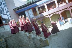 24 Tengboche Gompa 1997 Mani Rimdu Rehearsal Monks Enter Courtyard.jpg